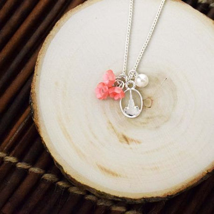 Temple Blossom Polymer Flower and Silver Colored Necklace