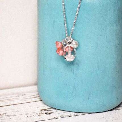 Temple Blossom Polymer Flower and Silver Colored Necklace