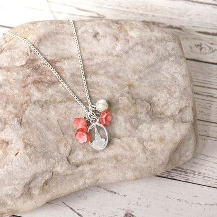 Temple Blossom Polymer Flower and Silver Colored Necklace